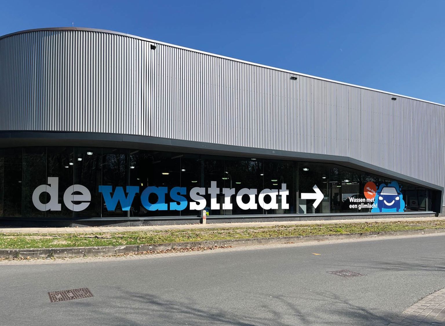 De wasstraat locatie branding